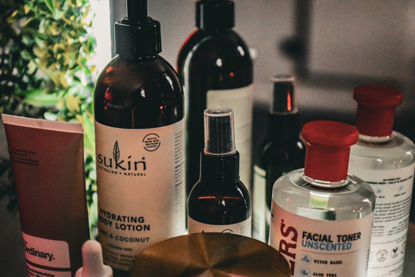 Natural skincare and aftercare products on the vanity